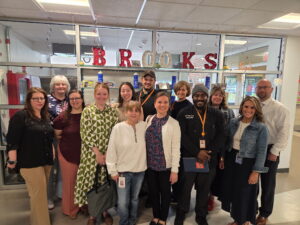 Staff of New Bedford, Massachusetts elementary school posing for a photo