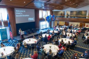 Photo of FRAC President Crystal FitzSimons speaking in a ballroom at FRAC's 2025 Benefit Breakfast