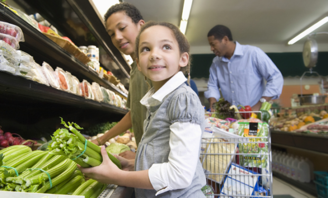 Family Picking Out Food in Grocery Store