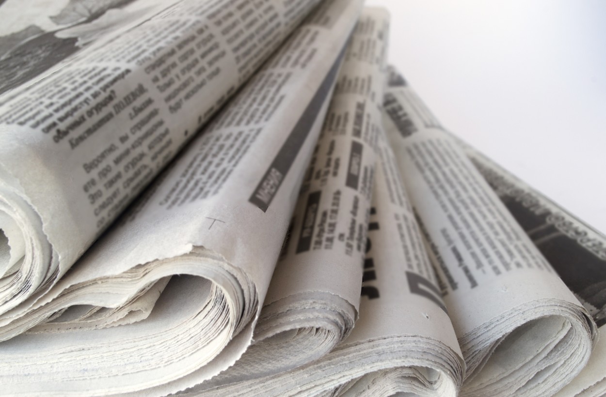 Photo of bundle of newspapers